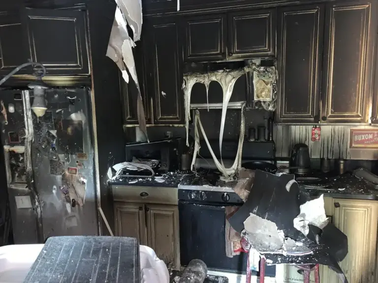 Kitchen with smoke and fire damage
